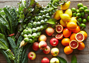 a group of fruits and vegetables on a wood surface Healthy Weight Loss Diets Allesley Green